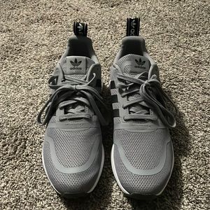 Gray adidas athletic shoes size 11. Never worn!